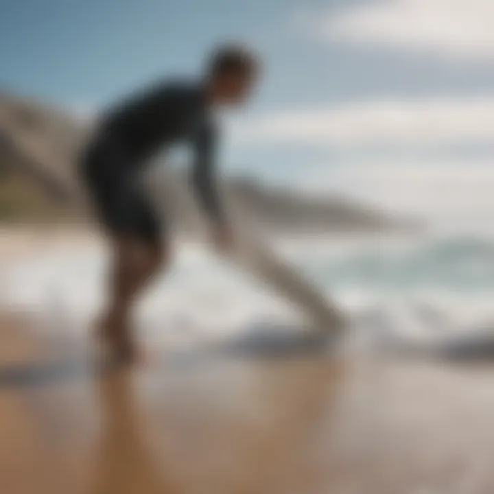 A surfer studying wind conditions on a beach