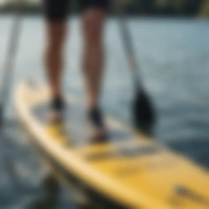 Close-up of paddle board dimensions being measured