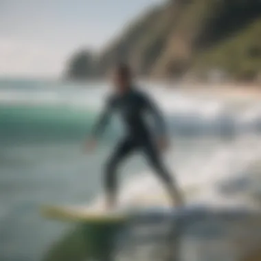 A surf instructor guiding a beginner in the ocean