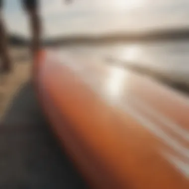 Close-up of a surfboard on the beach