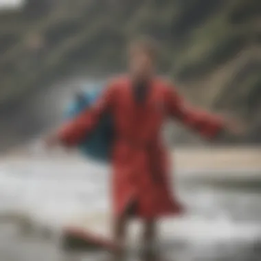 A surfer comfortably changing out of wet gear with a dry robe