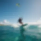 A kite surfer gliding over the crystal-clear waters of Barbados