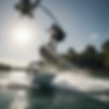 A wakeboarder in action behind a boat equipped with a Krypt tower