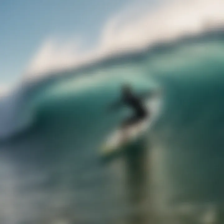 Surfer riding a wave in Santa Teresa