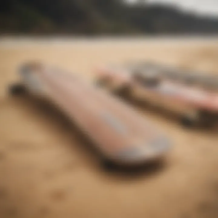 Various longboard types displayed on the sand