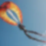 Vibrant kite soaring against a clear blue sky