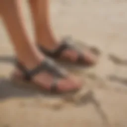 Stylish Olukai Sea Turtle Sandals on a sandy beach