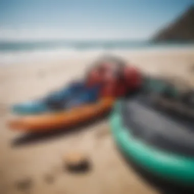 A stunning view of Roxy Bayshore with colorful watersports gear laid out on the sand