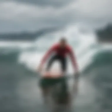 A surfer paddling out with determination