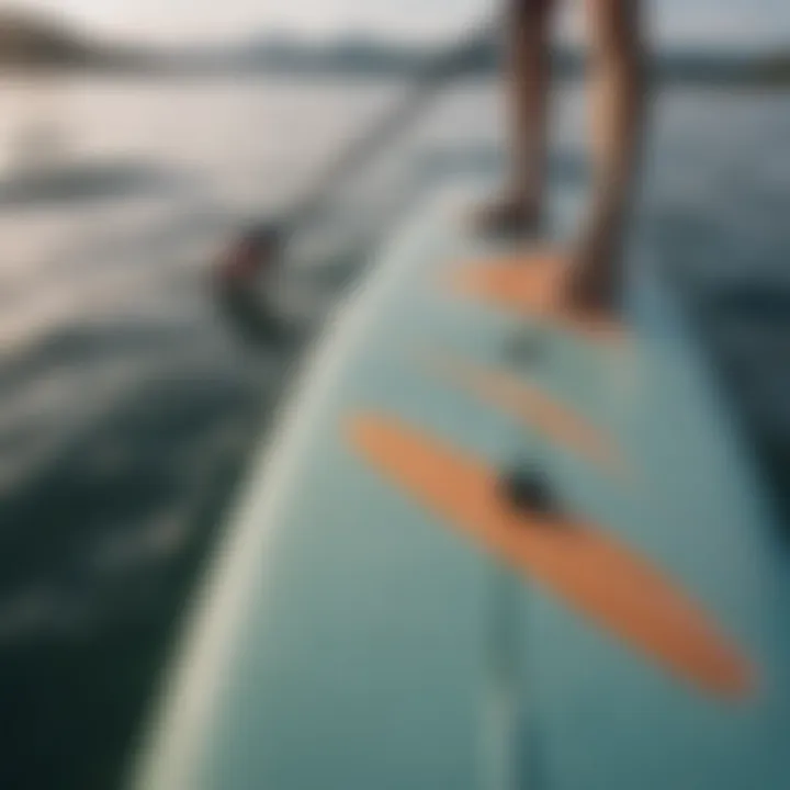 A close-up of a paddle board showcasing its design and features.