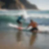 Surf instructor guiding a student on a wave