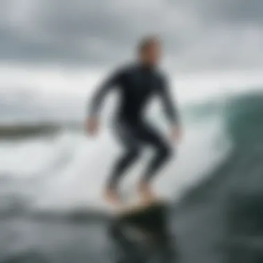 An athlete wearing a wetsuit while surfing in ocean waves