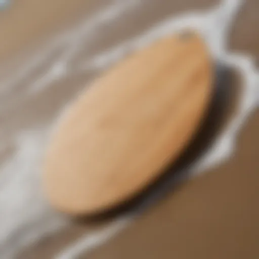 Close-up of a wooden skimboard showcasing its smooth finish and craftsmanship