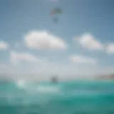 A breathtaking view of kiteboarders riding the crystal clear waters of Aruba