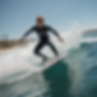 A scenic view of a surfer riding a jet surfboard on crystal-clear water.