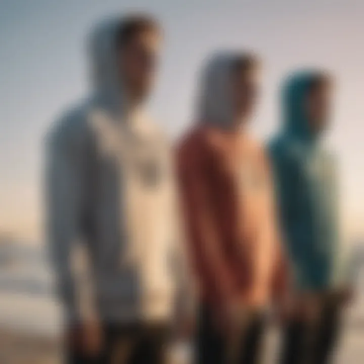 Group of surfers wearing Rip Curl Anti Series hoodies at sunset