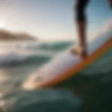 Detailed view of a 7 foot surf board showcasing its fin setup and tail design