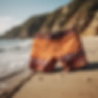 A serene beach setting with Volcom boardshorts laid out on the sand