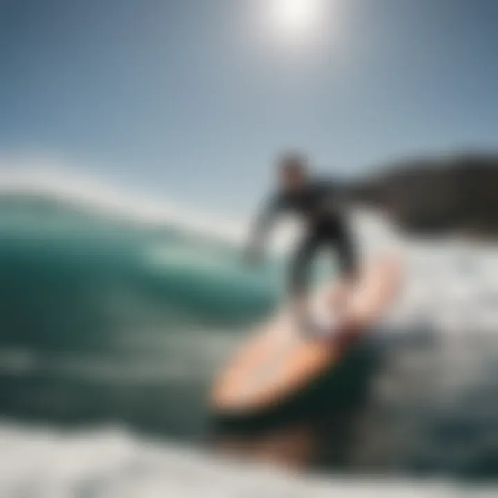 An O'Neill top showcased on a surfboard against a backdrop of crashing waves