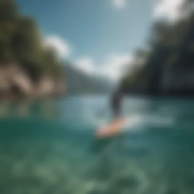 A paddleboarder navigating through crystal clear waters