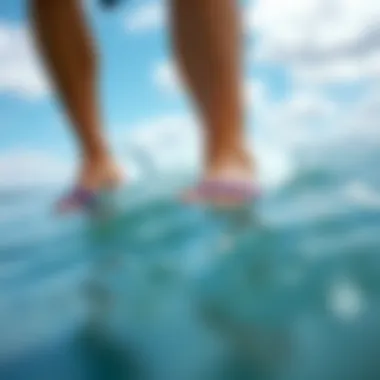 A person wearing purple Sanuks while engaging in watersports