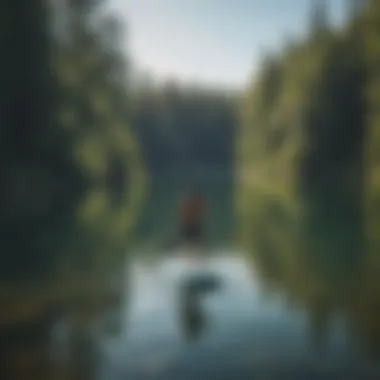 A serene lake scene demonstrating paddle boarding in action