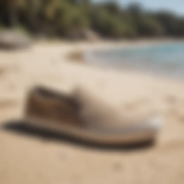 Billabong slip-on shoes on a sandy beach next to water