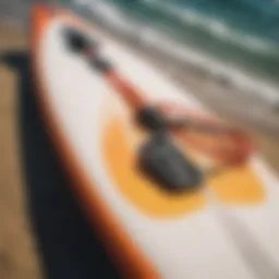 A vibrant key leash securely attached to a surfboard.