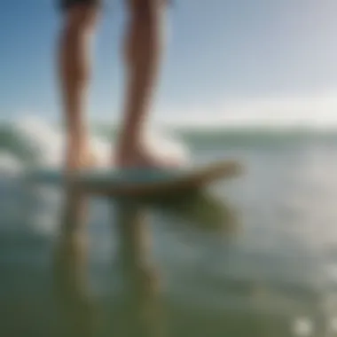 Close-up of surfboard and feet positioning during pop up