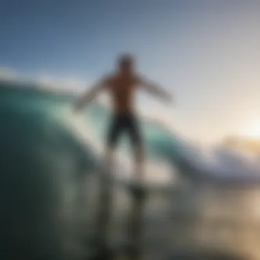 Surfer catching a wave at the moment of popping up