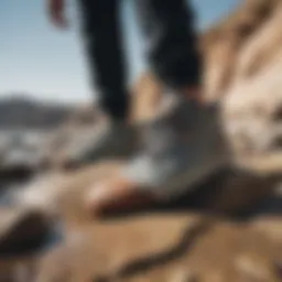 Stylish Volcom water shoes on a rocky shoreline