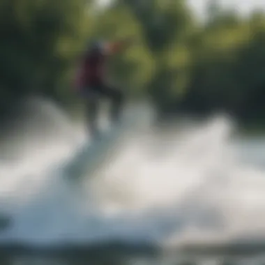 Action shot of a wakeboarder utilizing the universal wake tower